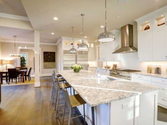 White Kitchen Design - Luxurious Home in Prior Lake