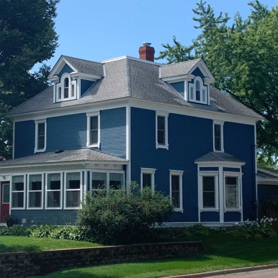 restored blue victorian home