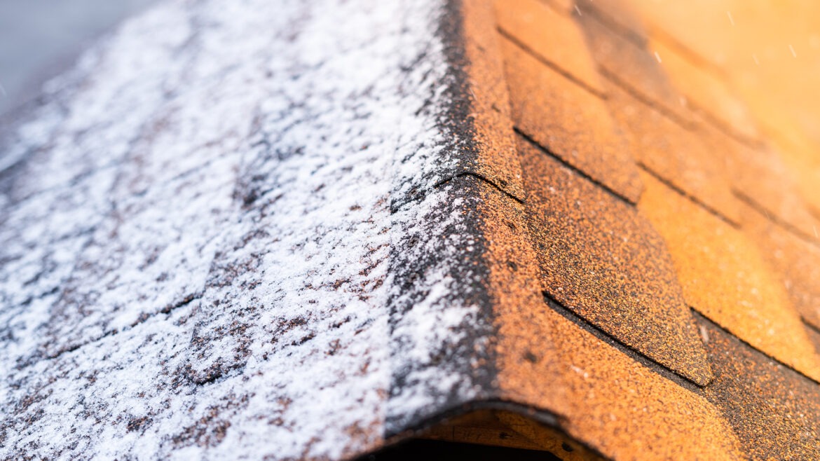 Spring is a good time to consider roof replacement as the sun melts snow on a roof