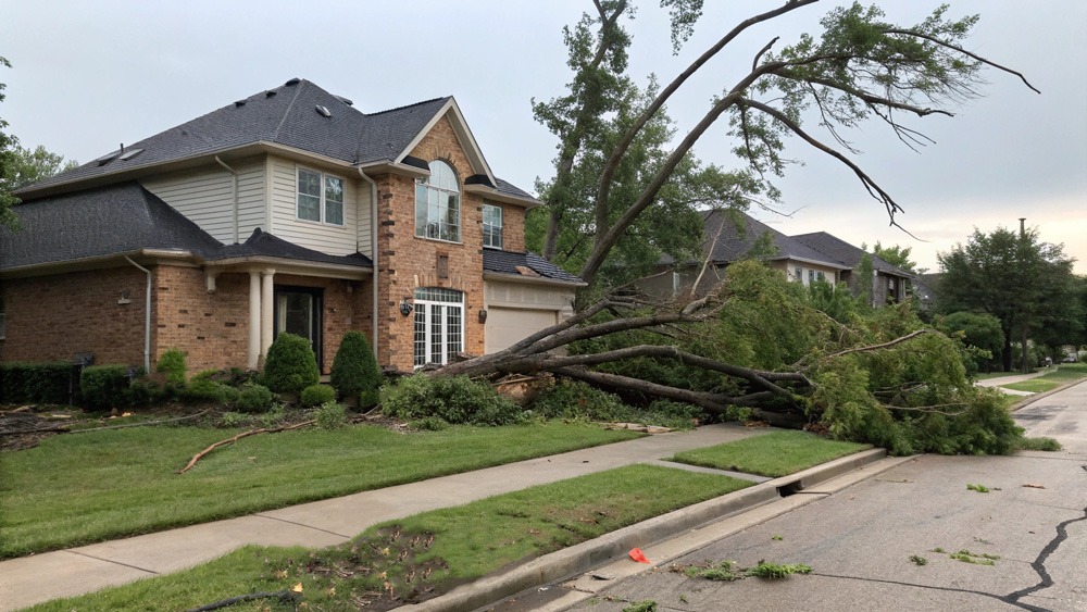 upscale suburban home with storm damage needing to submit a home insurance claim